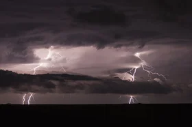lightning-striking-during-a-nighttime-storm-2025-04-04-05-00-26-utc.jpg
